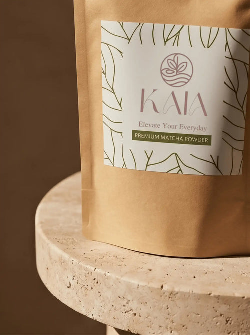 Close-up of KAIA Origin premium matcha powder label, Belgian stone-ground matcha packaging detail