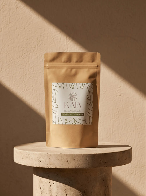 KAIA Origin premium matcha powder 80g pouch on travertine pedestal, Belgian stone-ground matcha