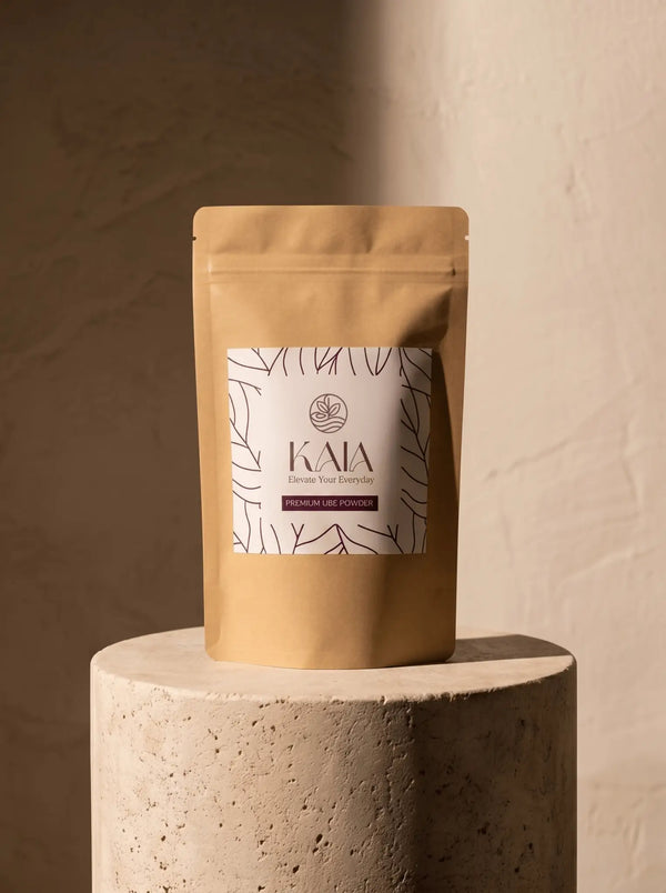 KAIA Origin premium ube powder 100g pouch in editorial  setting, Belgian freeze-dried purple yam premium packaging